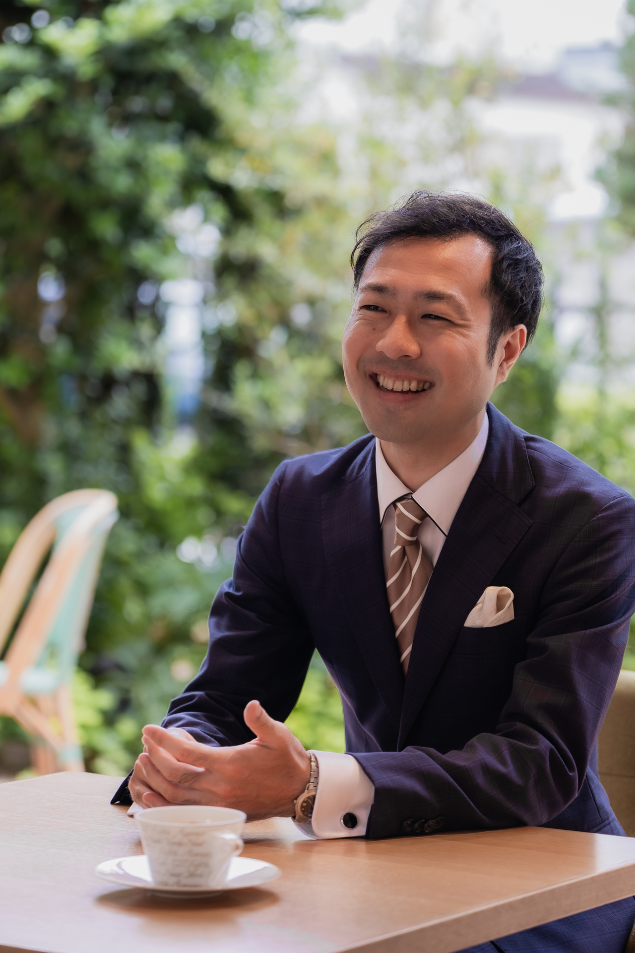 代表の川﨑英宏